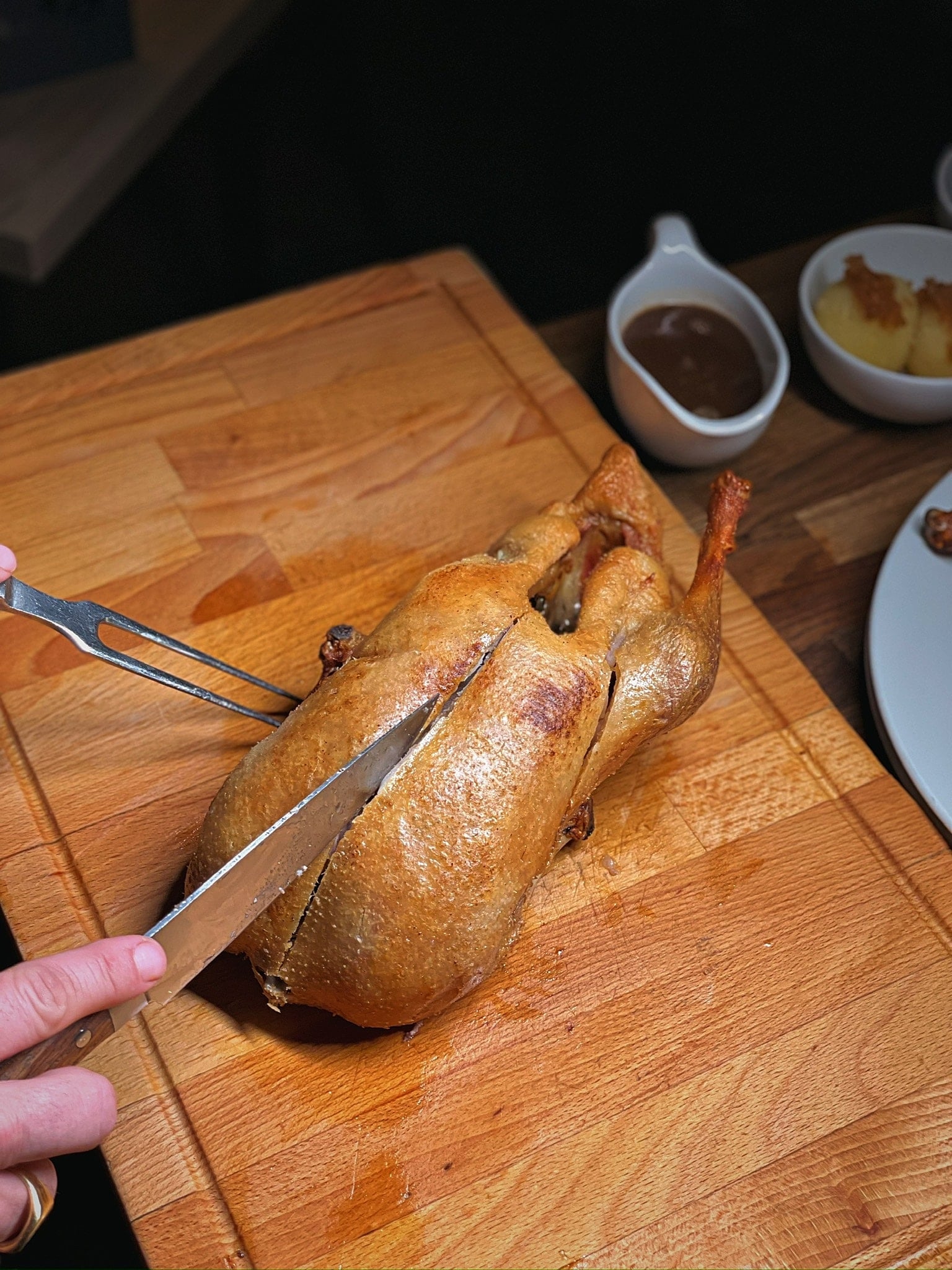 Duckman duck carved at the table – knife, crisp duck and sauce boat